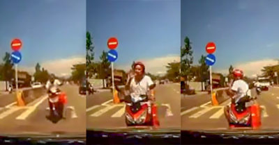 Video: Thanh niên đi xe máy ngồi lì giữa đường chặn đầu ôtô