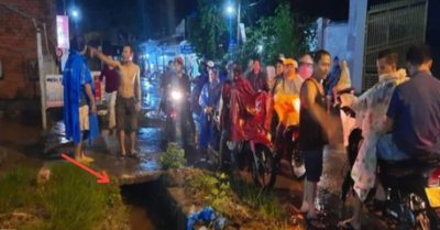 Đi bộ giữa trời mưa, người phụ nữ rớt xuống cống nước bị cuốn mất tích