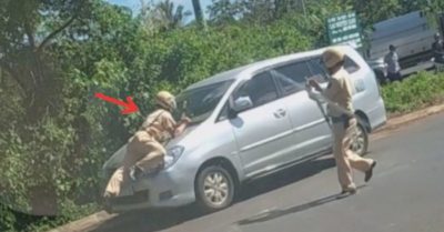 CLIP: Cảnh sát giao thông đu mình trên nắp ca-pô ôtô khi xe đang di chuyển