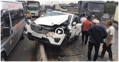 Video tông vào đuôi xe container, xế hộp trèo lên dải phân cách