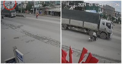 Cú drift xe máy của người đàn ông tránh ôtô tải vượt đèn đỏ