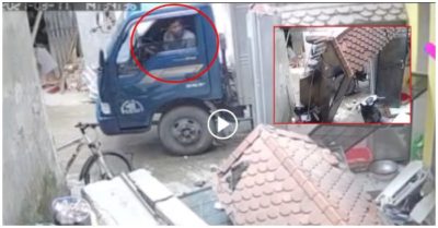 Video khoảnh khắc ôtô tải tông sập cổng nhà dân, đè hỏng luôn xe máy trong sân