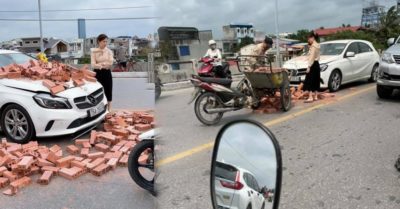 Xe xích lô chế chở gạch lấn làn tông xế hộp Mercedes trên cầu
