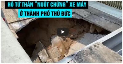 Video trời đang mưa, vỉa hè bất ngờ sụp xuống ‘nuốt chửng’ xe máy