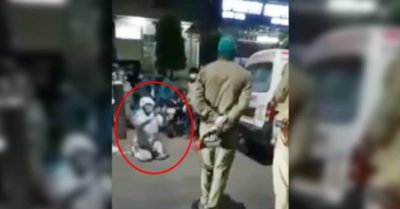 Video con trai quỳ lạy xin cảnh sát không lấy bình oxy của mẹ