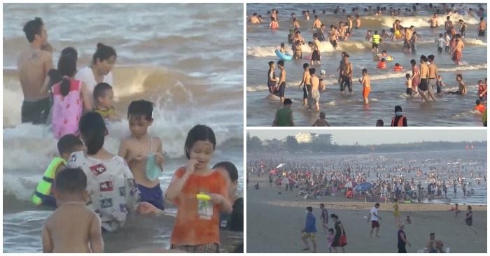 Biển Sầm Sơn đông nghịt người tắm biển vào ngày nóng tháng 6/2021. Ảnh chụp màn hình video Dân Trí.