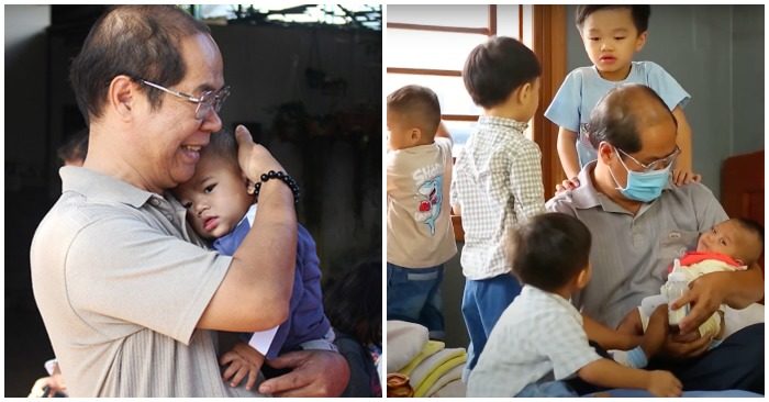 Ông Nhật cùng Bé Đinh Đức Độ 5 tháng tuổi và các bé khác đang quây quần quanh thầy khi thầy cho em bé ăn sữa (ảnh chạp màn hình trên báo VnExpress/ THVL Tổng Hợp).