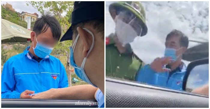 Người đàn ông mặc áo khoác xanh bất ngờ đến yêu cầu công an cho xe trước mặt quay đầu (ảnh chụp màn hình trên trang Afamily/cắt từ clip)
