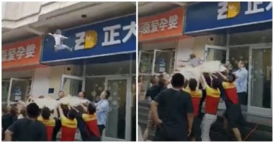 Video: Người dân căng rèm hứng bé trai rơi khỏi cửa sổ chung cư