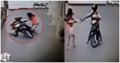 Clip: Bị giật túi xách, cô gái nhặt dép trả lại tên cướp