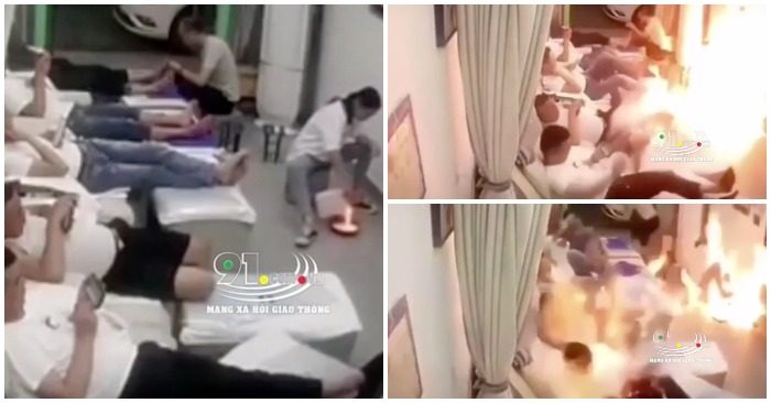 Cô gái cầm cả can cồn đổ vao khay nướng mực khiến Spa bốc cháy (ảnh chụp màn hình video).