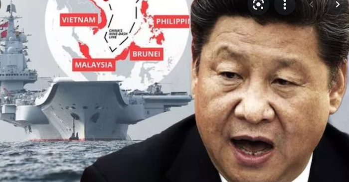 AMTI trích hình ảnh vệ tinh cho thấy các tàu dân quân Trung Quốc ra vào khu vực quần đảo Trường Sa (ảnh chụp màn hình Daily Express).