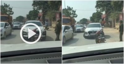 Video: Dừng xe máy giữa đường vì ôtô cố tình chạy lấn làn