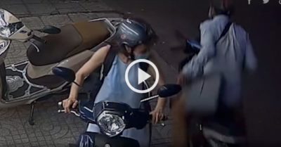 Clip: Cô gái bị cướp áp sát, giật laptop trong một giây