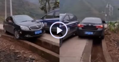 Video: Tài xế lái ôtô lên cống thoát nước để vượt qua xe đỗ giữa đường