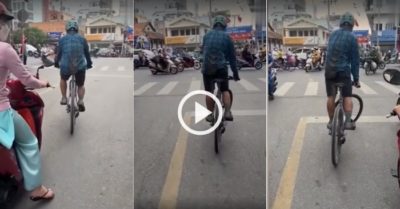 Video: Người đàn ông đi xe đạp quyết không hạ chân xuống dù chờ đèn đỏ lâu