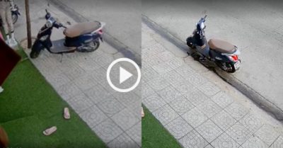 Video: Xe máy tự lùi khỏi vỉa hè xuống đường