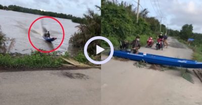 Video: Chàng trai lái xuồng máy băng qua đường bê tông